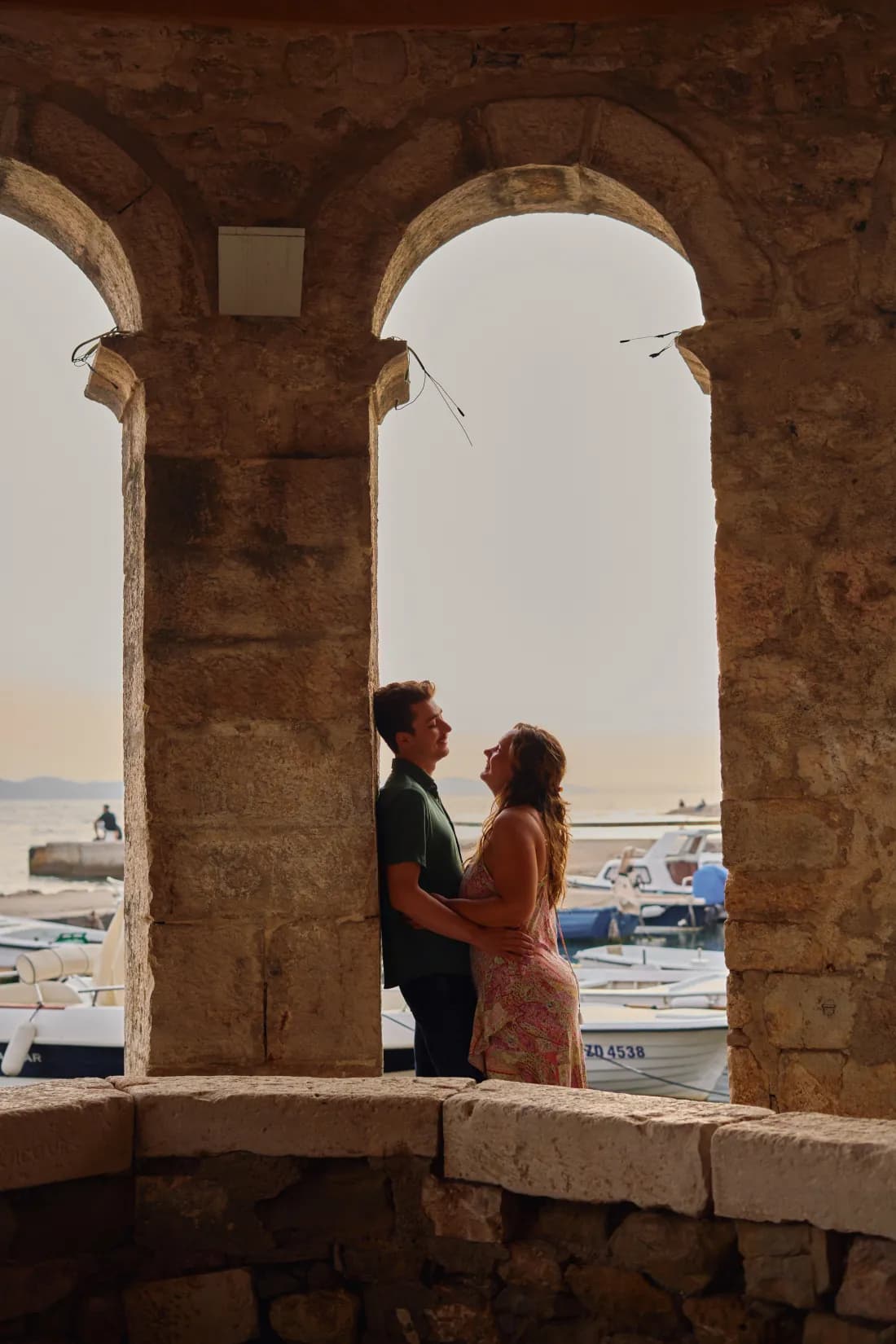 Couple walking through the old town streets of Zadar